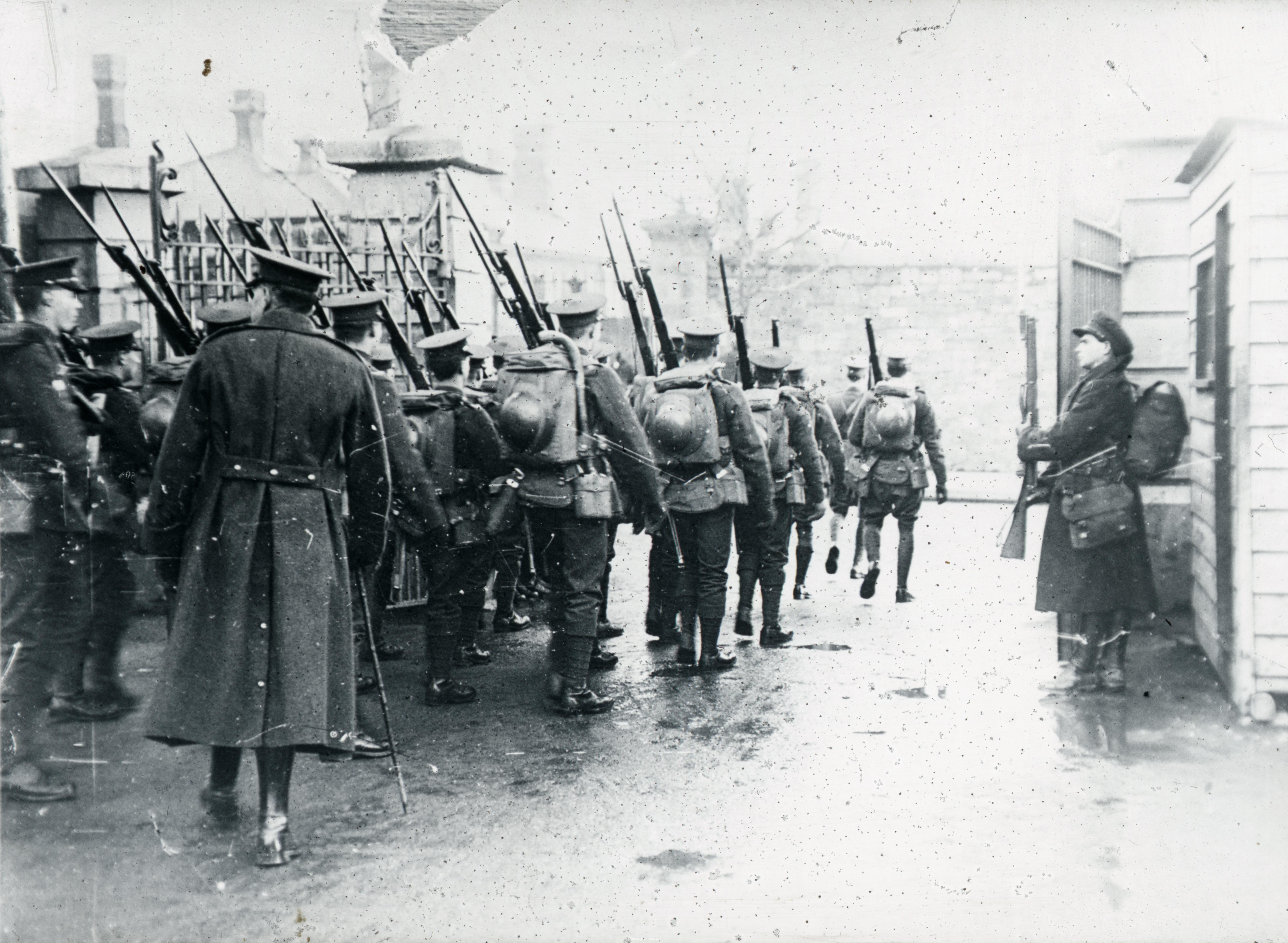 British-Army-marching-out-of-a-Dublin-barracks-with-shouldered-arms.